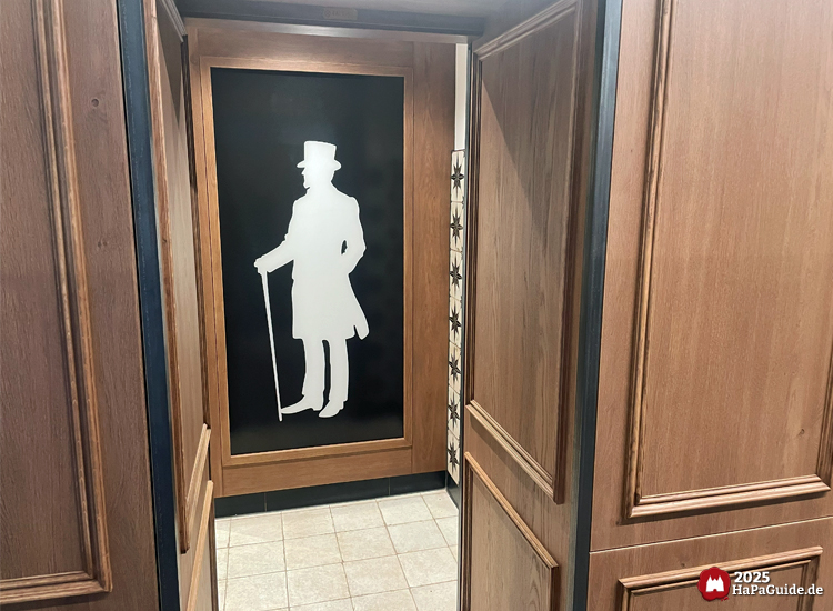 Service-Center - Zugang Herrentoilette mit historischem Piktogramm